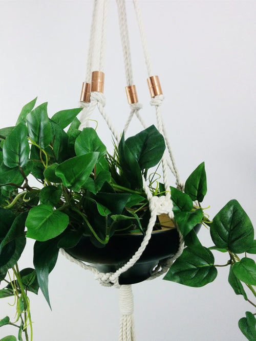Macramé hanging planter with copper