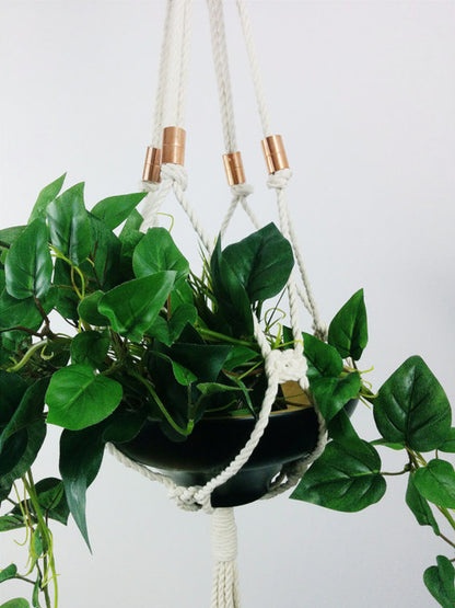 Macramé hanging planter with copper